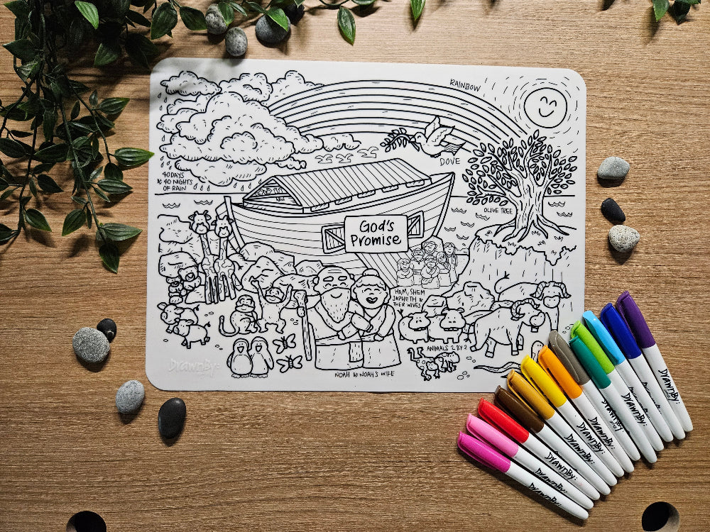 DrawnBy: God's Promise Bible Story on a wooden surface with markers and stones.